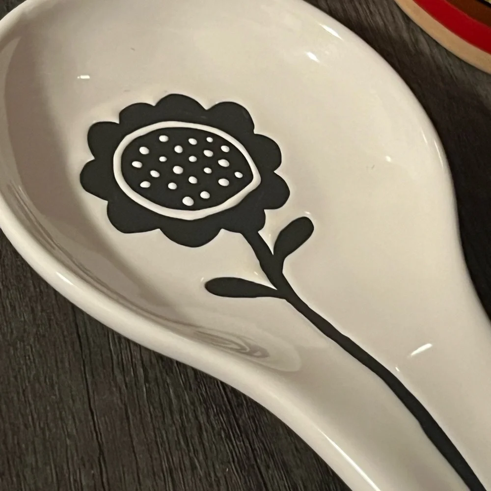 Off-White Ceramic Spoon Rest with Black Sunflower Design